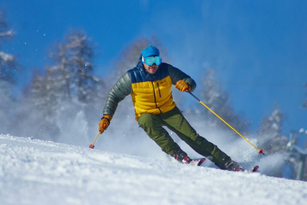 a man skiing in the mountains